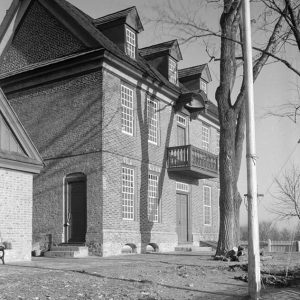 Balcony with hooded roof