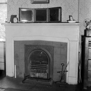 Coal-burning fireplace with tiled surround