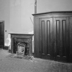 Gothic Revival freestanding closet cabinet and fireplace