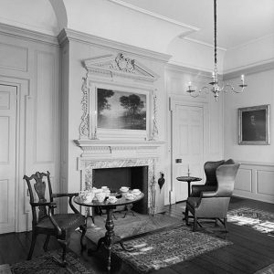 Marble fireplace surround and overmantel with broken pediment